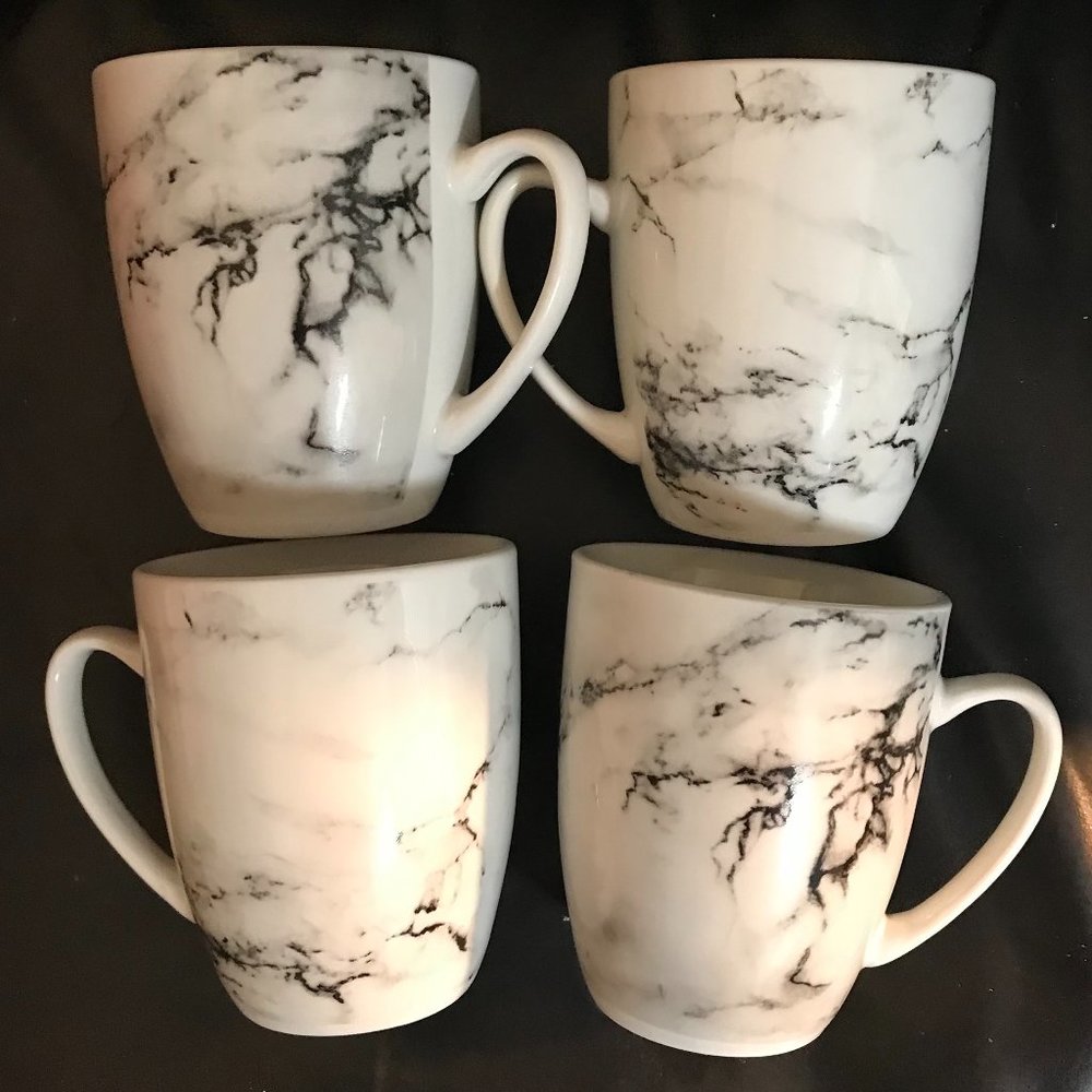 Four Lauren Taylor mugs